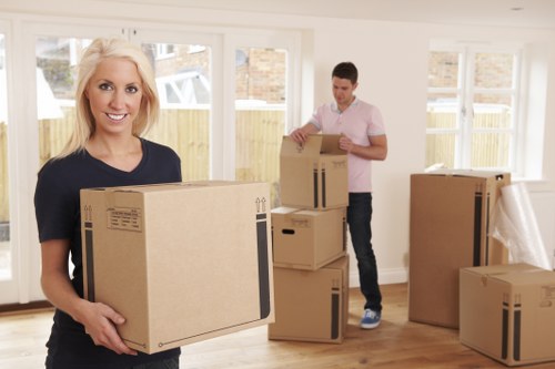 Packed office furniture and boxes ready for relocation