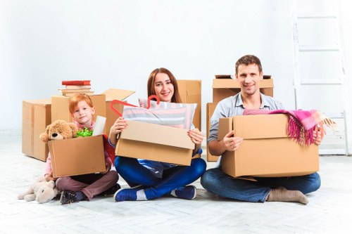Removal team planning a move in Battersea with boxes and furniture