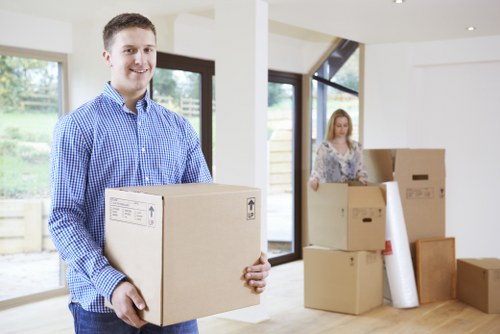 Student removals team loading boxes in Battersea