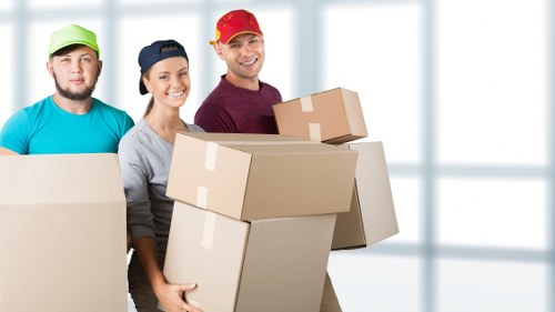 Team preparing desks and IT equipment for a business move