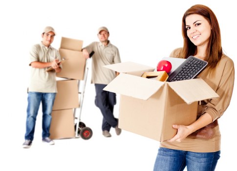 Loading boxes and household items into a moving van
